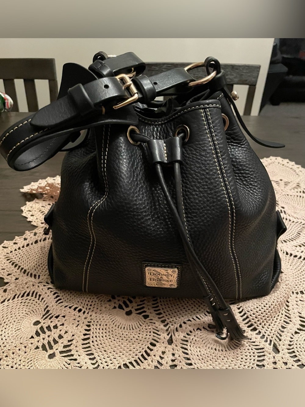 Dooney & Bourke black pebbled leather drawstring bucket bag